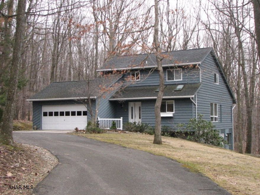 Very well maintained. Updated kitchen features travertine tile, granite countertops and skylights. Great room boasts a stone fireplace with custom shelving on both sides, vaulted ceiling and a nice wooded view. Step into the 1st floor master and enjoy the fireplace and deck, a walk in closet and ensuite bath with jetted tub make a complete package. 2nd floor includes 3 bedrooms and an updated bath. Familyroom has a walk out to patio, wet bar, and a bath. Plenty of storage, all on a 1.75 acre lot. Super nice house!!!