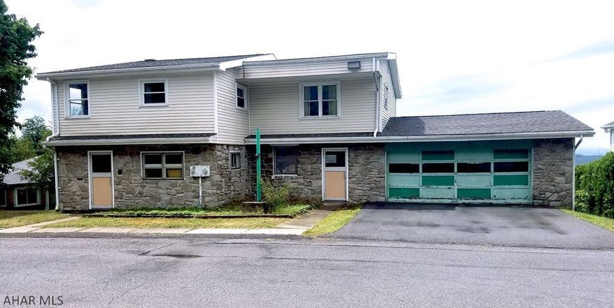 The old Shaughnessey Hardware Store in Gallitzin.  This property will bring out your creative side.  Two large rooms on first floor that could be used multiple ways.  Apartment upstairs that could be a rental or your own place.  It has living area, dining area, kitchen, 2 bedrooms and a full bath.  Lots of storage space in the basement.  In need of some TLC.  Being sold as-is.