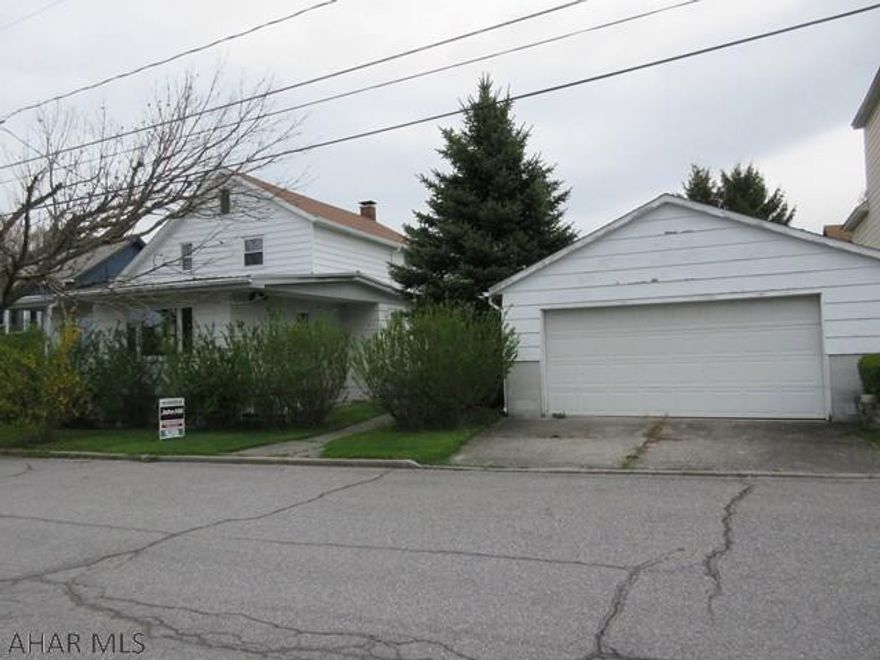 Portage home in need to TLC. Nice yard and lots of room inside. Enclosed rear porch, 2 car detached garage, storage shed. Enough potential to make it your own! Property sold AS-IS. Seller will make no repairs. Offers must be submitted through HUD approved broker. Buyer pays both transfer taxes. Equal Housing Opportunity.
