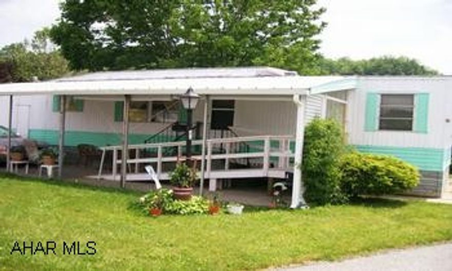 55+ PARK, LOT RENT $230 INCLUDES TRASH, SHED, RAMP