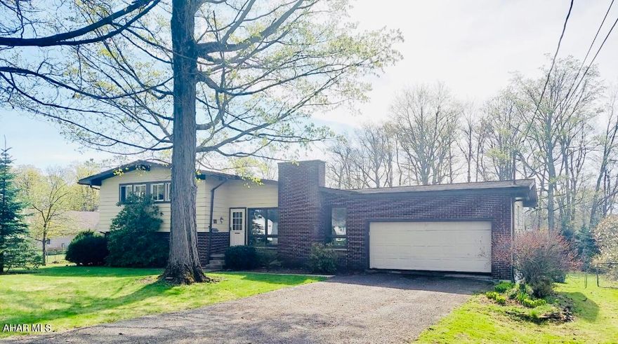 Check out this spacious 3 bedroom 4 bath home with an inviting floor plan that awaits you at this residence in Cresson borough! Home features a multi level design with a screened in porch to take in all of the seasons and great for entertaining!
This residence features spacious formal dining as well as an expansive living room , The lower level of home features an area that could be used for a variety of purposes, guest  quarters, home gym, office, there are many possibilities. The lower level of this residence also features a bar area and a space dedicated to pool. Call today for your tour!