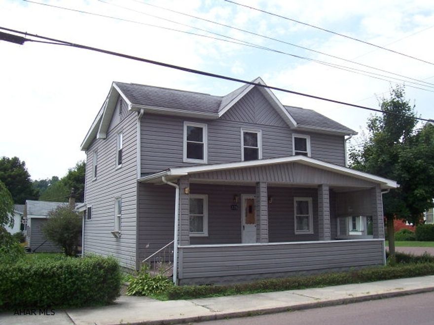 Nice 2 story home on a corner lot with new thermopane windows, vinyl siding and 3 yr. old furnace. Large front porch 23x7 and a nice rear deck 12x11 for grilling/relaxing.  1 car detached garage and parking for 3 cars.