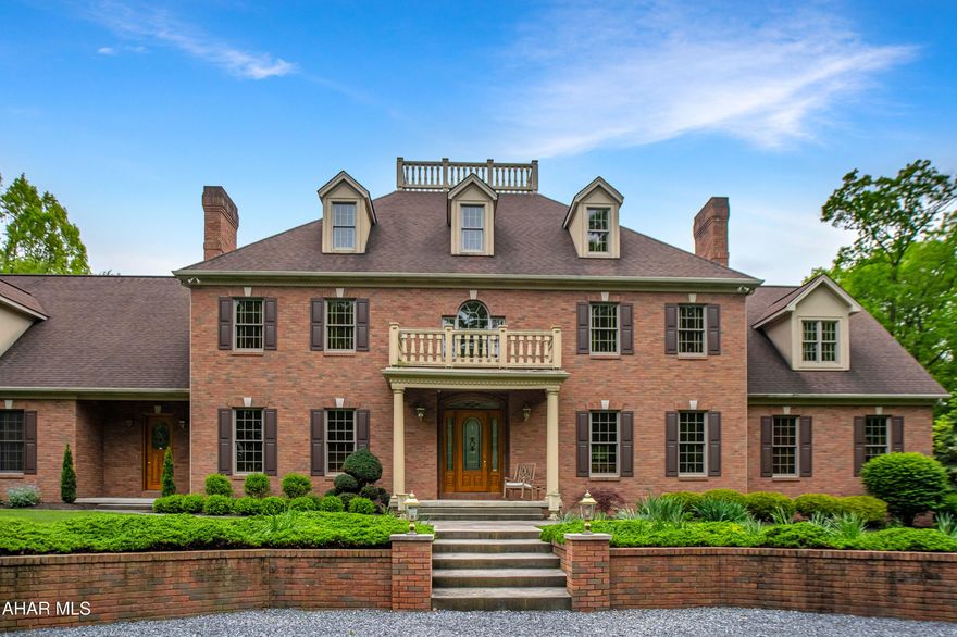 Set on just over 18 secluded acres, this magnificent gated estate offers a rare blend of luxury, privacy, and peaceful living. From the moment you enter, the soaring cathedral-ceiling foyer and grand staircase create an unforgettable first impression. The gourmet kitchen is a chef's dream, featuring abundant cabinetry, a spacious center island for meal prep or casual dining, and a built-in wine rack for added elegance.

The flexible floor plan allows for up to six bedrooms and includes three full bathrooms, providing ample space for family and guests. The first-floor master suite is a standout feature, complete with a cozy fireplace, an expansive master bath, and oversized walk-in closets.

Additional highlights include a four-car garage and a private rear patio - ideal for relaxing or entertaining in your own serene retreat.