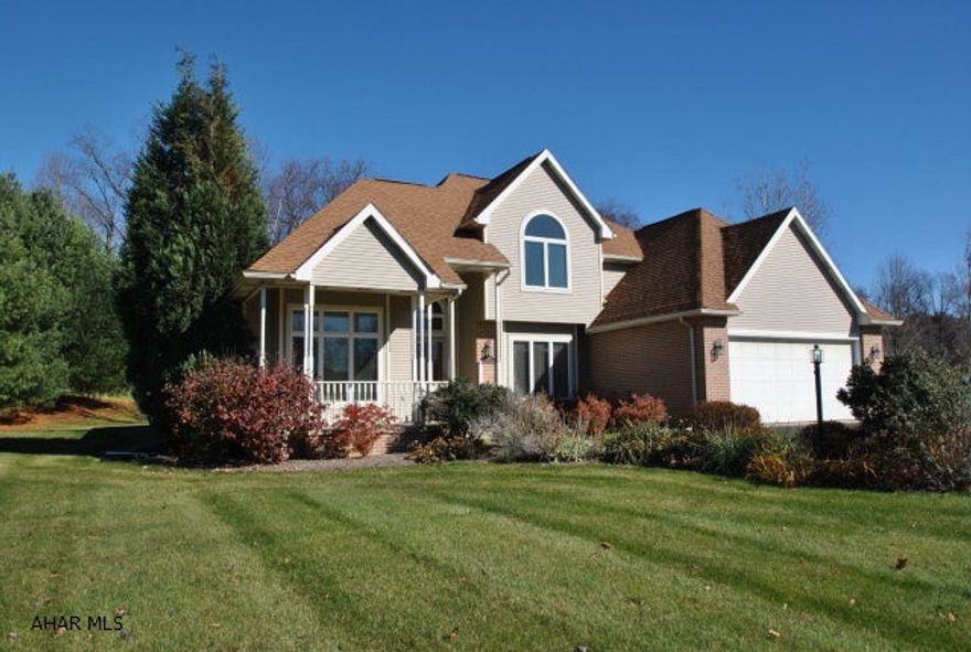 This 4 bedroom home is ready for your family.  Sitting on 1.6 acres, & features such special items as an efficient geo-thermal system to help keep those utility bills to a minimum, a whole house generator in the event that power should go out, and a wonderful glass enclosed 4-season porch.  If that's not enough, how about a new (upscale) kitchen with new LG appliances & new hardwood flooring.  A vaulted ceiling in the living room with floor to ceiling windows to bring in the outdoors & a gas fireplace for those cool evenings.  Entertaining, the lower level is finished with new carpeting & paint and has a half bath that is plumbed for a shower.  The upper level boasts of 3 additional bedrooms and a spacious studio/guest room & to top it all off, how about an oversized two car garage.