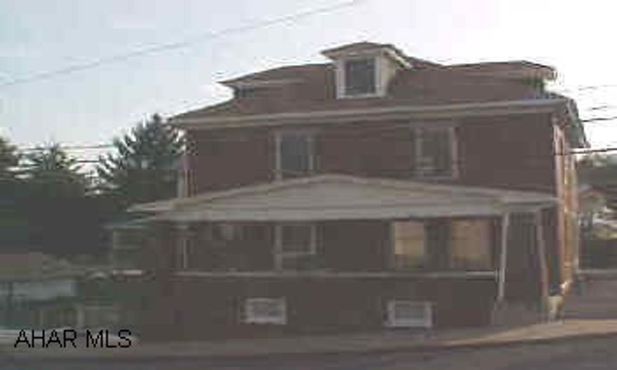 BEAUTIFUL  2 STORY BRICK,4 BEDROOMS,NEW KITCHEN W/CERAMIC FLOOR,DINING ROOM WITH FIREPLACE,LIVINGROOM W/GLASS POCKET DOORS,ALL ORIGINAL WOOD WORK,SUN PORCH,FENCED IN YARD,1 CAR GARAGE,ON CORNER LOT BEAUTIFUL 2 STORY BRICK,ORIGINAL WOOD WORK,4 BEDROOMS.ON CORNER LOT