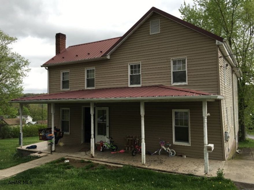 Spacious home on a double lot in Saltillo with beautiful mountain views! The house has 4 large bedrooms and 1  baths. Master bedroom and  bath on the main floor. Inviting covered front porch, vinyl siding, metal roof and a three car, heated detached garage with  bath. Close to Raystown Lake, State Parks, State Game Lands, Pa Turnpike and Interstate 70!