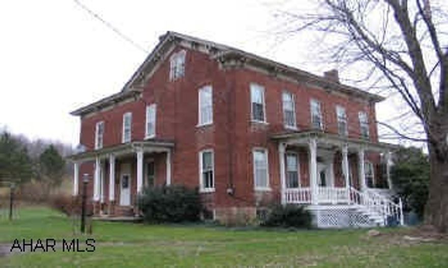 Charming 2-Story brick home build in 1861. High ceilings, 4BR, sitting room, eat-in kitchen, den, living room, formal dining room. Pine plank floors covered with carpet. Has wood/coal furnace.