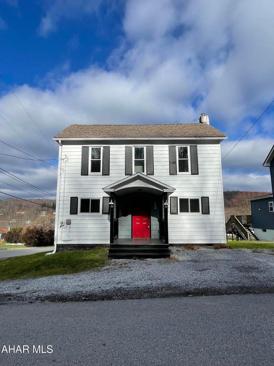 Have you been looking for a house in Penn Cambria School District, then this might be the one for you! This 3 bedroom 2 bath home on a corner lot in Lilly Borough is within walking distance of library and all public areas such as pickleball/tennis courts and walking trails. There is plenty of space to entertain in this house with a living room that can accommodate a large sectional and an eating area in the kitchen. Store all your bulk items in the walk in pantry.  There is a 3/4 bath and laundry room right off the kitchen.  A first floor bedroom completes this level.  Upstairs there is a large bedroom with a walk in closet, a full bath and an additional bedroom.  A walk up attic for storing seasonal items and walk out basement has a workbench for all your projects. Finishing out this property is a new garage for all your large toys.  Call today!