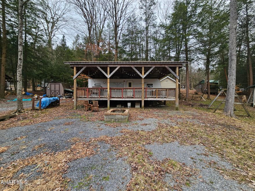 2006 30' camper on 1 lot inside Glendale Yearound. Camper has a large deck attached to it and a pavilion over camper and deck. Everything works in camper. Camper is clean and in good condition. Campsite is only a few minutes walk from small fishing pond. Shed included also.