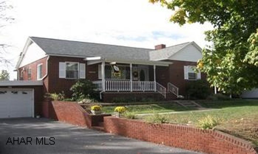 Brick Ranch In Hollidaysburg Boro.  4 Bedrooms - 2 Baths - 2 New Kitchens - Family Room With Fireplace - New Roof - Windows - Hot Water Furnace - Central Air - Workshop  - Garage - Level Lot.  All Appliances Excellent Condition!!