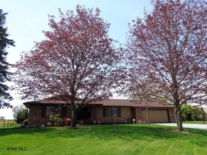 Exquisite Ranch Home, built by Bob Greenleaf. Beautifully well maintained with updated kitchen and baths. Oversized 2 car heated garage with lots of storage. Architectural 3 year old roof. Spacious master bedroom offers a large walk-in closet and master bath. Garden areas are full of perennials. For an extra bonus room, a 3 season sunroom with heater included. Qualifies for Rural Housing Loan. Also included with purchase are a garden bench,& patio door window treatments.