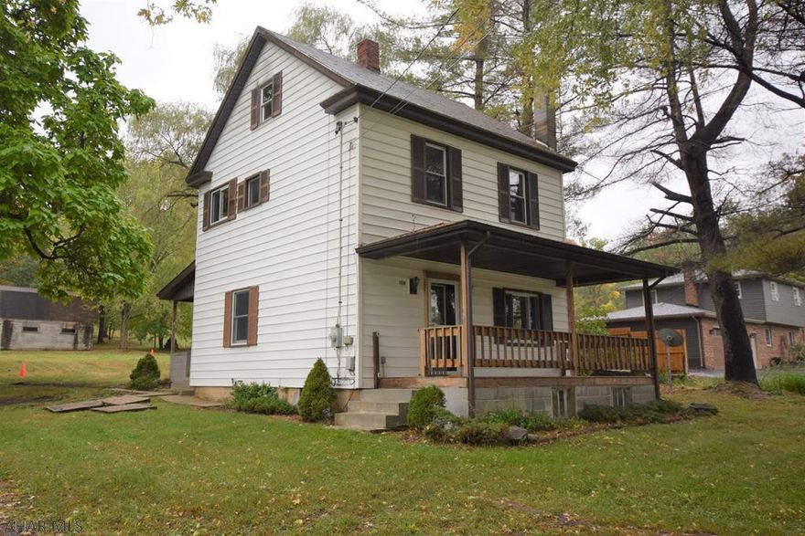 Country living on over an acre with plenty of space for your RV and ATV's.  Three bedrooms, one bath, two-story home with hardwood floors and newer furnace.  New sand mound system under construction.  Public water.  Garage with new roof and second story for storage, workshop, or man cave.