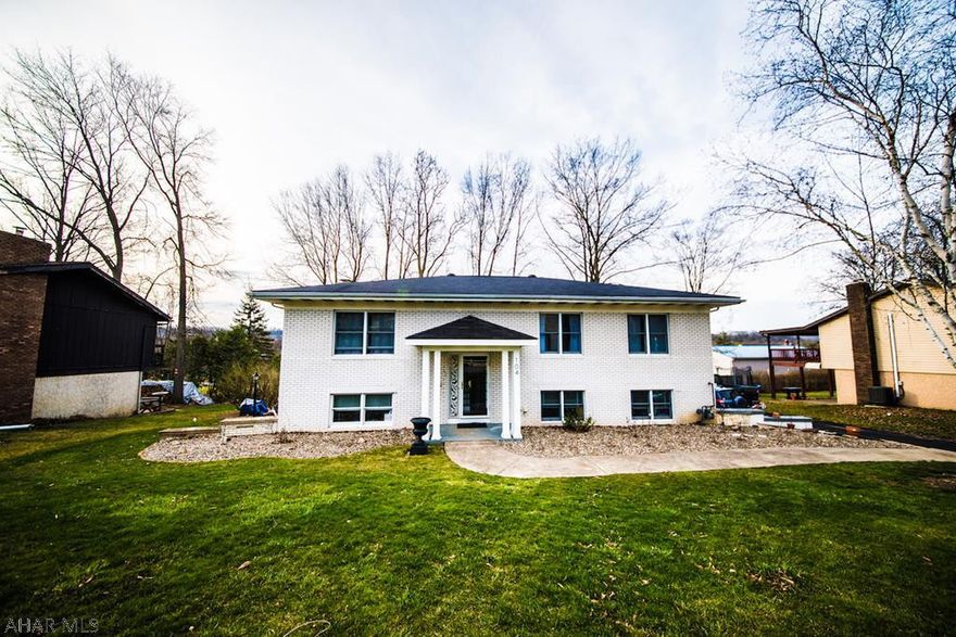 Completely remodeled 4 bedroom home. Upgrades at every turn. 10 Foot stone gas fireplace. Tiled showers, hardwood floors, large open floor plan with granite counter tops. Tank less hot water for unlimited hot water. Oversized garage. The list goes on. Come and see for yourself.