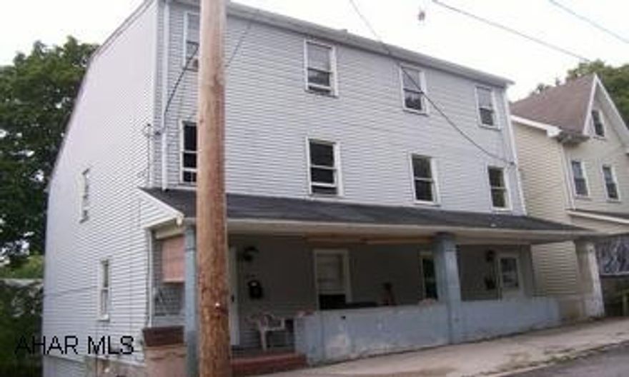 Two story vinyl sided double house. Each unit has 2 bedrooms and finished attic. Two story vinyl sided double house. Each unit has 2 bedrooms and finished attic.