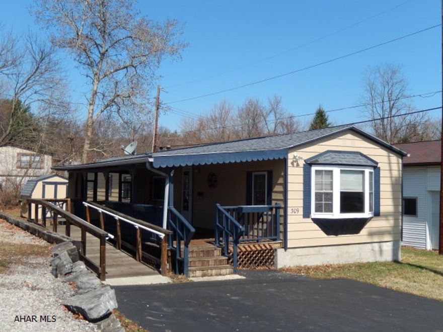 Cute singlewide on a foundation in Logan Township. Nice Area! Many updates! Newer Windows, Doors, Roof, Furnace  and Fuel Tank. Includes large covered front Deck with swing, New Shed, Off Street Parking for 4, All Appliances and Fuel oil! This house also has a ramp leading to the front deck. This well maintained home is perfect for a 1 or 2 people! AS IS