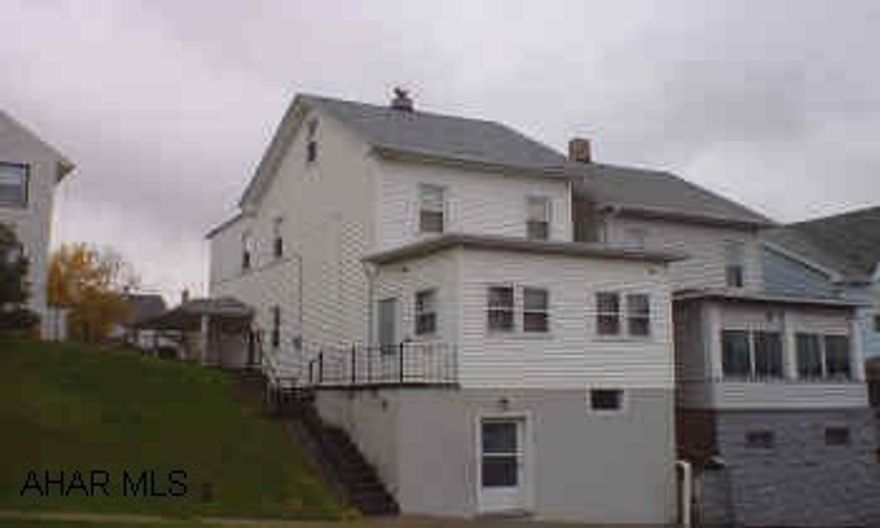 Very well cared for 2 1/2 story vinyl sided home, 3 bedrooms, enclosed and heated front porch, hardwood floors and more.