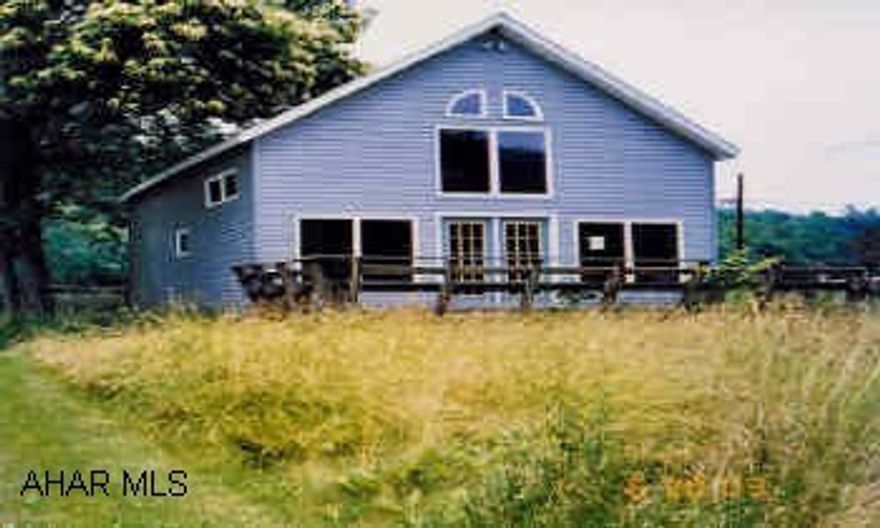 A-Frame with 2 bedrooms, 3/4 bath, kitchen, living room on main floor, loft has 3/4 bath and 1bedroom.