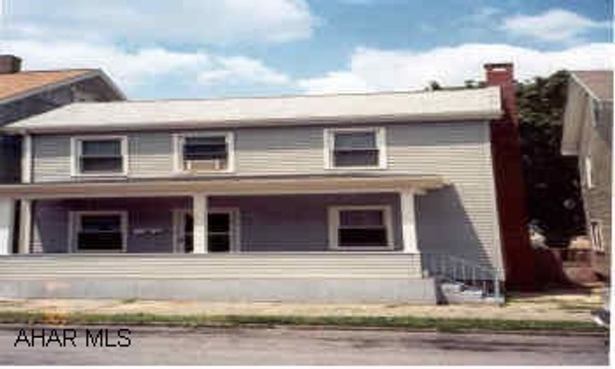 2 story Vinyl, front porch, rear deck, 3 bedroom, 1 bath, kitchen, dining room, living room.  Deck 12'x17', 2 stall garage, covered front porch. new Vinyl Siding, New Windows, update wiring, roof 6 yr old, new hot water tank, newer furnance.