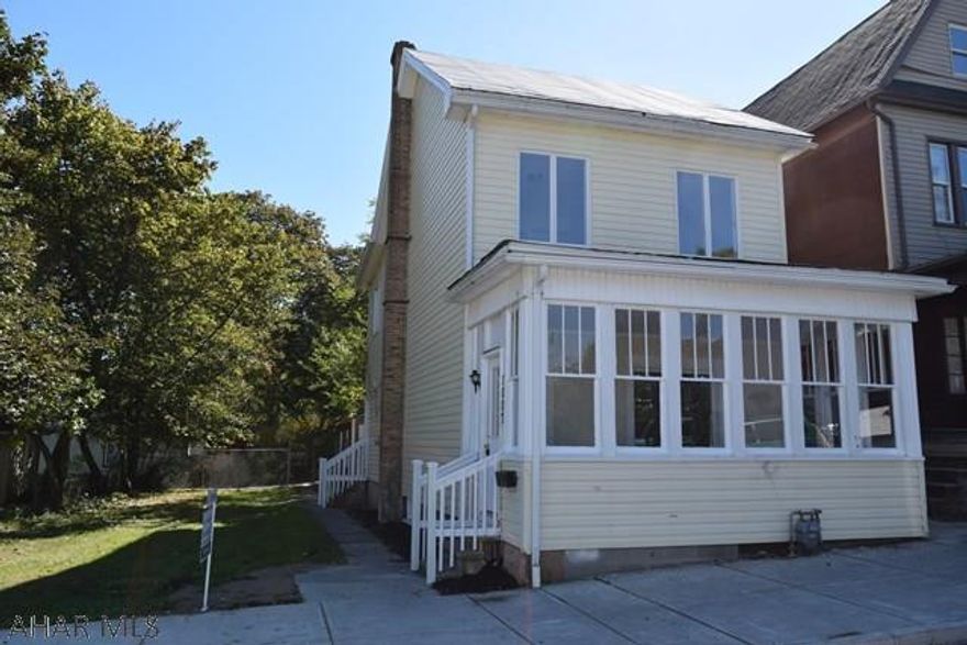 Move in ready 3 bedroom home on a 50x100 lot and a detached garage. A new city park across the street and conveniently located. The walk up attic can be remodeled for additional living space. Come out and take a look at this one before it is gone as it is priced to sell.