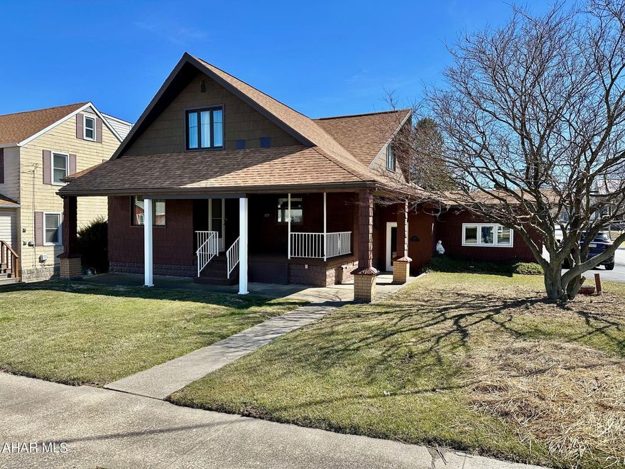 Lots of space in this 5 bedroom Craftsman style home on a corner lot in Carrolltown PA.  Main floor includes kitchen/dining, living room, full bath and 3 bedrooms.   The second floor has 2 large bedrooms with built-ins, half bath and an additional office/den.   Partially finished basement with stone fireplace, 3/4 and 1/2 bathrooms.   Attached to the main house is 2500 sq feet of office space with 10-12 work stations, several private offices, break room and all furnishings included.  400 amp of electric service to the property, high speed internet, heated with electric heat pumps.  Oversize 26 x 28 2 car attached garage and ample off-street parking.