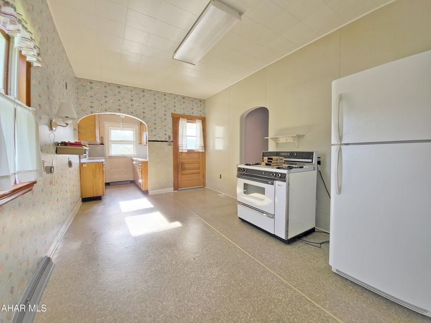 This home offers an abundance of living space on three finished floors plus the basement!  There is unrealized potential with the generously sized kitchen, formal dining room large living room.  The main floor features a 3/4 bath with step in shower, the second floor has a 3/4 bath with tub.  Don't miss this great opportunity to gain sweat equity in a great location on almost 1/2 an acre!