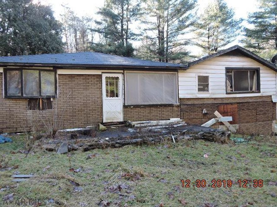 Nice private ground.  No road frontage.  Long lane to get back to house can be impassable.  Must use 4 wheel drive or atv.  Great hunting camp.  There is an old mobile home sitting on the property included in sale.  There is no title for it and there is no information on it.  Public water is available thru Houtzdale Municipal.  There is no public sewer available.  Septic is unknown.  Coal rights are not included.  Other mineral or gas rights are unknown.  No showings allowed until Governor's stay at home mandate is lifted or revised.  For the first 20 days in the mls the property is to be marketed to owner occupants only.  Investors offers will not be responded to until the 20 days has expired.