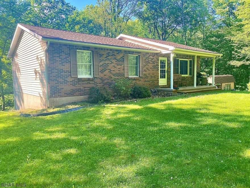 Enjoy all that is beautiful home has to offer.  This well-maintained home features 3 bedrooms and 2 full bathrooms.  Take advantage of this private location which is minutes away from Raystown Lake and adjacent to State Game Lands. Unwind and take in the breathtaking views on the covered back deck or covered front porch.  So many possibilities with this fantastic home. Call for more details or to schedule a showing today!