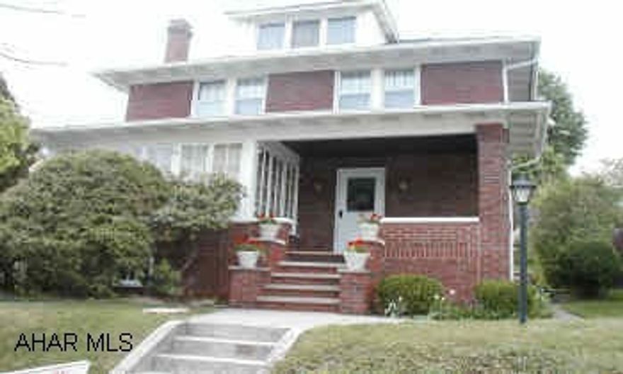 DOUBLE LANE DRIVEWAY IS NOT SHARED.  LOVELY BRICK IN CALVERT HILLS. 3 BEDROOM, 1.25 BATH, FINISHED ATTIC W/HEAT COULD BE 4TH BEDROOM. YEAR ROUND SUNROOM ON 1ST FLOOR. FRONT & BACK PORCH WITH NICE LANDSCAPING & PRIVACY. 2 LANE PAVED DRIVEWAY FOR OFF STREET PARKING.