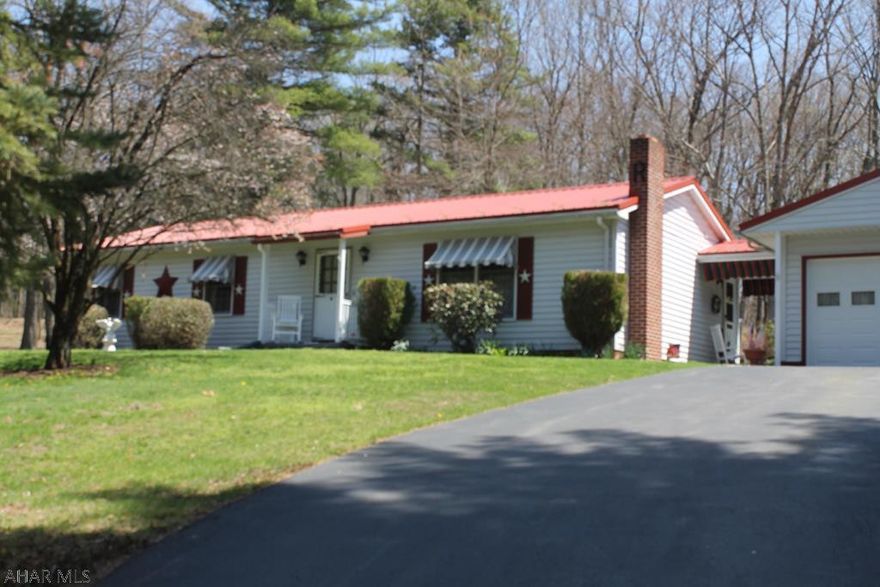 This captivating property features a well-maintained ranch style house, 3 bedroom 1 full bath, situated on 14 acres, landscaped and wooded. An open floor plan with fabulous views await you.  Enjoy the serenity the property offers or engage in recreational activities in your very own backyard. The finished basement boasts a comfortable family room and laundry area with plenty of storage and many options including a hook up for a wood stove.  An ideal primary residence or vacation home conveniently located.  Newer roof, new water heater.  Move-in ready.