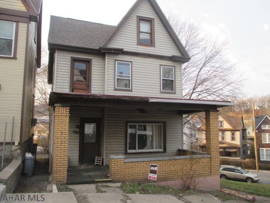 Handyman special. 2 story brick/vinyl home with new roof. Property being sold as is. Could be a great rental. Inside needs totally redone. Make an offer.