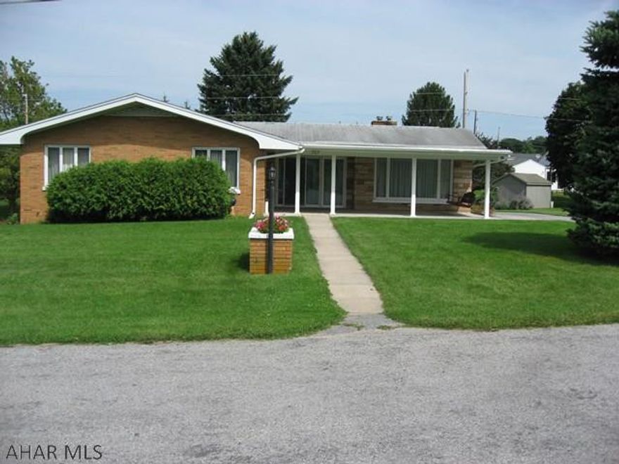 This brick ranch sits on .51 of an acre has 3 bedrooms 1 bath with hardwood floors. Has a cut stone fireplace with insert and a 1 car integral garage.