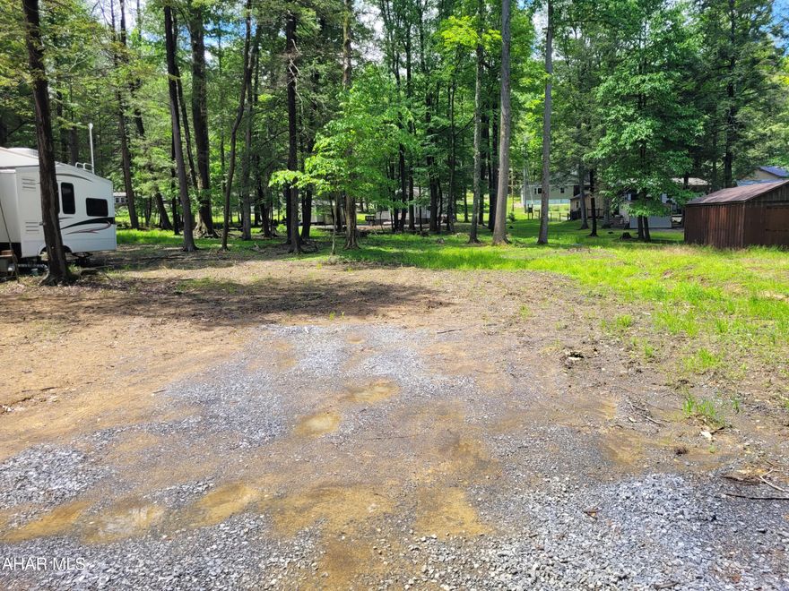 If you are tired of hauling your camper and setting it up each time you want to camp, take a look at this year round campsite. Almost a fourth of an acre of woods with public water and sewer. Come at your convenience and stay as long as you want. Glendale Yearound is a gated community with a clubhouse, swimming pool, tennis/basketball/volleyball courts, playgrounds, dog park and planned activities. We are adjacent to Prince Gallitzin State Park / Glendale Lake and six miles from Rock Run ATV Park.