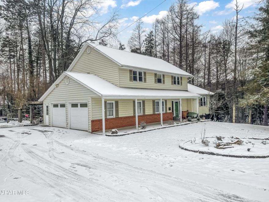 Welcome to 901 N Caroline Street where convenience meets privacy. This gorgeous home located within the borough of Ebensburg features 3 lots that are adjoining to the Ebensburg Reservoir, 2 of which are wooded for added privacy. These 3 lots combine to an approximate 1.18 acres in town! The home itself features many updates throughout and has plenty of space for almost any family. As you enter the main floor, you will be greeted by a beautiful foyer. Off of the foyer is a formal dining room, formal living area, large eat-in kitchen, second living area, half bath for guests, & access to your garage. Continue further upstairs and you will be greeted by a picturesque hallway which leads to 4 of your 5 bedrooms. 3 of the bedrooms are cozy and have plenty of space. The 4th bedroom is the master bedroom w/ walk-in closet and en suite bath. The basement of the home features a fully custom irish pub w/ fireplace & drybar. Also in the basement is a full bath, bedroom, laundry, & unfinished space for laundry. The exterior of the property is where this home truly shines. The property includes a large 2 car attached garage, 2 sheds, waterfall w/ beautiful rock landscaping, & so much more. This property is truly one-of-a-kind within the borough.