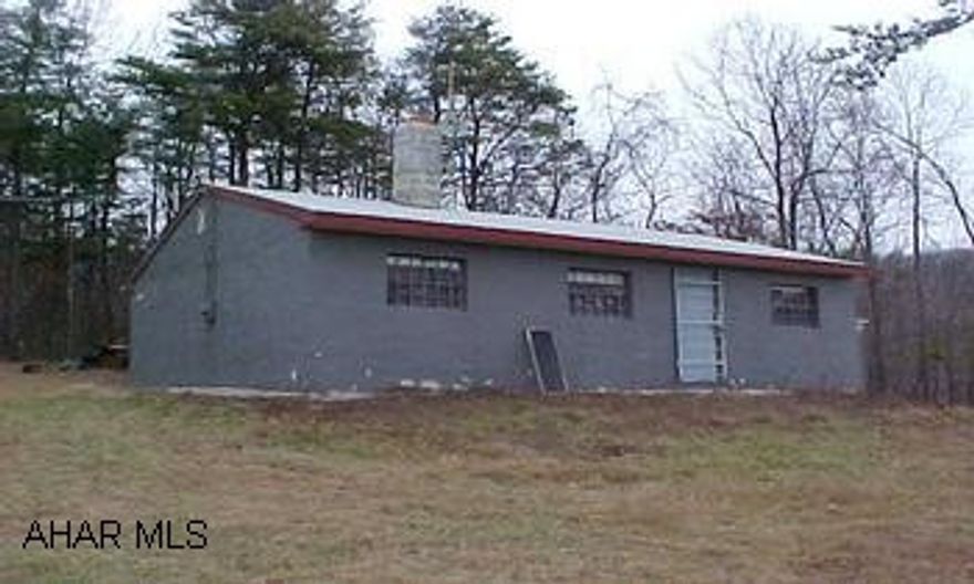 See agent for directions - Hunter's Paradise!!!  This property offers 141.43 acres with mountain views, seasonal streams and privacy.  Nice cabin with well, septic and electric.  Property is secluded but has township road frontage.  A great buy.