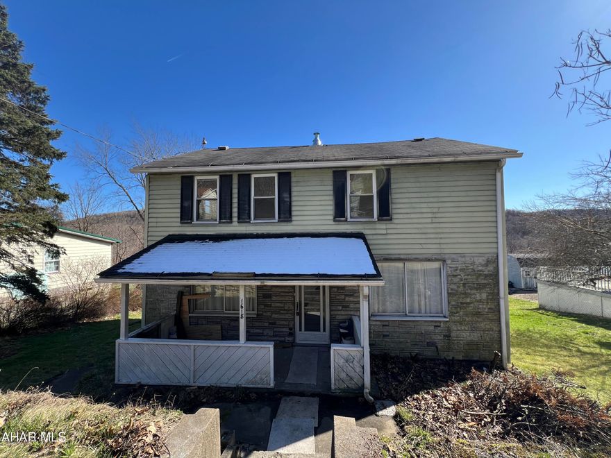 Move in Ready! When walking into this 2-story home you find the main floor features a living room with a fully remolded bathroom, large eat in kitchen, a dining room and a bonus room.  The second floor offers a remolded full bath, 3 Bedrooms and a loft area.   Covered front porch and a back closed in porch. level back yard, off-street parking, and so much more.