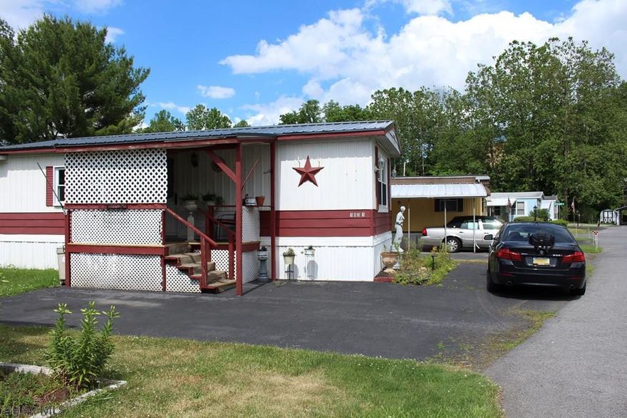 Totally updated manufactured home in Eldorado Court 55+ community.  2 large bedrooms and 1 full updated bath with dual vanity and walk in shower.  Updated eat-in kitchen with built in breakfast bar and included stainless steel appliances.  New metal roof, new flooring throughout the entire home, as well as, new drywall and insulation.  There is a laundry area with included washer and dryer. This move in ready home also has central air with nest thermostat.  Off street parking for at least 2 cars.  There is even a shed!  Matterport Virtual Tour available.