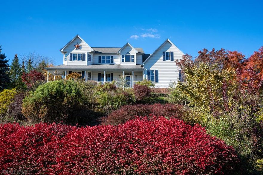 Enjoy mountain views from the porch of this custom-designed 4200 sqft gem sitting atop desirable Quince Court. Large eat-in kitchen has vast cabinet space. Large windows, high ceilings and open design make for a light-filled interior that's great for entertaining, while upstairs offers various BR and office configurations, incl primary suite (the views)! Comfort is always in season thanks to luxurious radiant heat and new AC unit (10 ceiling fans). The spacious yard is bordered by mature trees, and you'll effortlessly grow your own electricity with fully owned solar panels. Did we mention the first-floor in-law suite? Laundry room with chute? Two garages? New carpet? New paint? Too many unique touches to list!