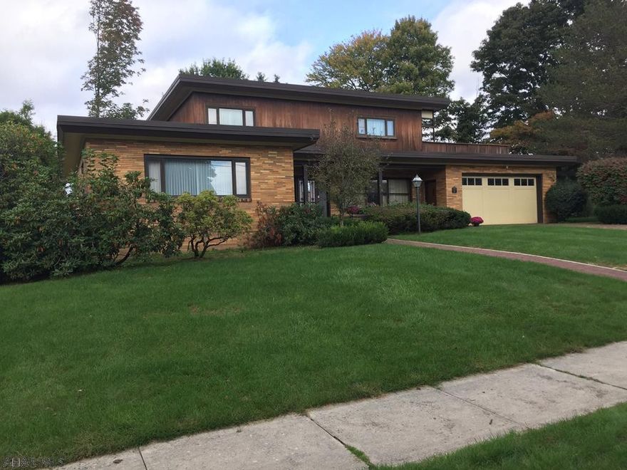 Mid century modern prestigious Ebensburg home. Sprawling main floor features a formal living and dining room, a family room w/ fireplace and brick and wood accents. Master suite with a bonus room, dressing room, and impressive master bath. Plenty of space with 5 bedrooms and 5 baths. Entertaining can be endless with the 16x32' indoor pool, sauna, lower level rec room, and patio all situated on a lovely landscaped corner lot. You won't be disappointed with all of the storage and quality craftsmanship found in this property. Pre-approved buyers requested. Call for your personal tour.