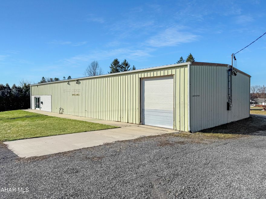 Discover a remarkable opportunity to own a prime commercial garage located in the bustling heart of Cresson, right along Admiral Peary Highway. This approximately 4,000 square foot garage is situated on a high-traffic road & encompasses over 1.5 acres of land, providing ample space for your business needs. The interior boasts a fully finished office area complete w/ a full bathroom, making it ideal for both management & operational tasks. With five overhead garage doors of varying sizes, this facility can accommodate a wide range of vehicles. Additionally, you'll find generous storage space & plenty of room to support any type of business—whether it be automotive, warehouse, industrial, or more. This property is ready for immediate use, offering endless possibilities for your venture! Don't miss out on this exceptional investment opportunity. Call today!