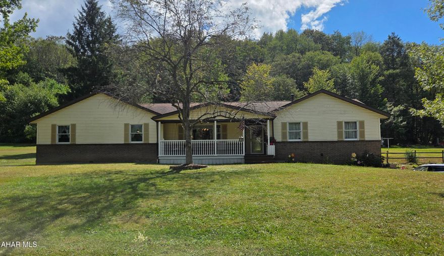 Welcome to this lovely three bedroom ranch home with 2.5 baths situated on 1.3 acres! Step inside this home you will find beautiful hardwood flooring throughout, solid wood doors, a large dining area leading out to a covered deck and spacious great room with lots of windows and a beautiful oak gas fireplace. 
The basement is partially finished with tons of potential! Enjoy relaxing on the covered front porch with composite decking. 
An added plus is a large three bay detached garage for all your storage needs.  This home has a lovely lot and lots of room to expand if needed.