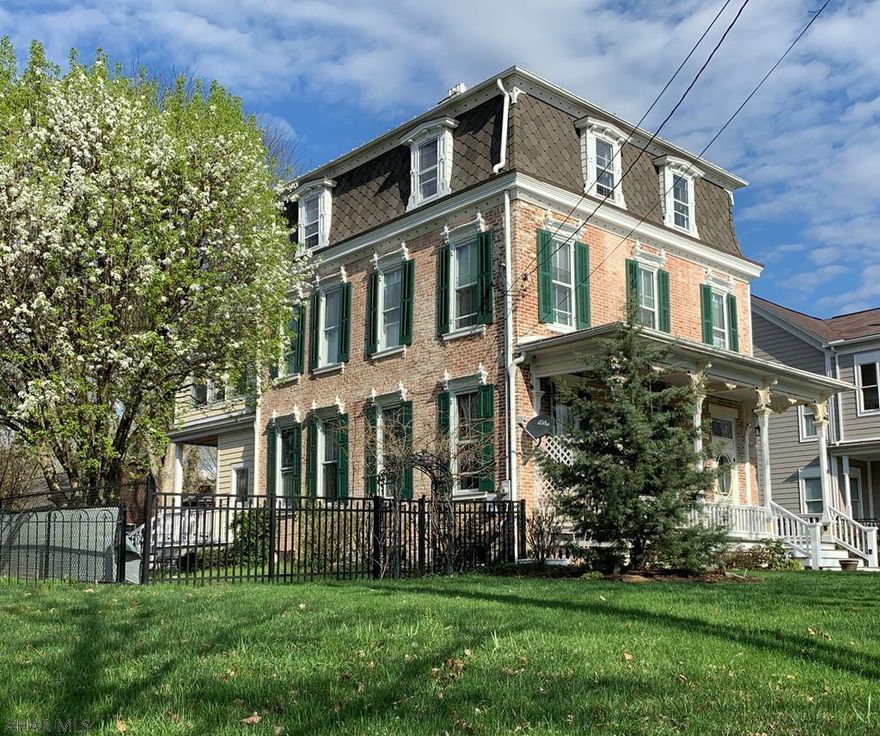 Step back in Bedford's historic charm in this 1874 second empire style brick home which reflects the magical merging of inspiration and architecture.  A masterpiece of design and craftsmanship featuring native cherry hardwood custom cabinetry, extraordinary intricate moldings, granite countertops, upscale appliances, copper farm sink, antique stained glass windows and so much more.  From the chef's kitchen to the romantic owner's suite this home will inspire and impress even the most discriminating buyer.  Yes, this home is exquisitely restored and represents the beauty of this enchanting town of Bedford nestled in the foothills of the Allegheny Mountains.