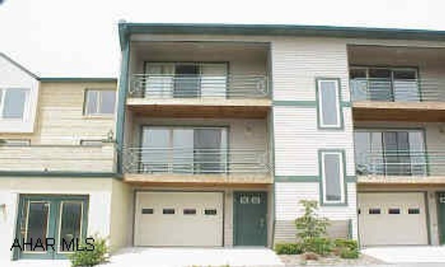 The HOA includes the trash, building insurance, snow removal, and yard maintenance.