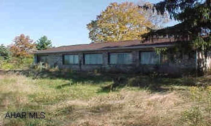 Rancher on .7 acres of ground.  Offers 4 bedrooms and 2 baths. Call Lori for your preview of this property.