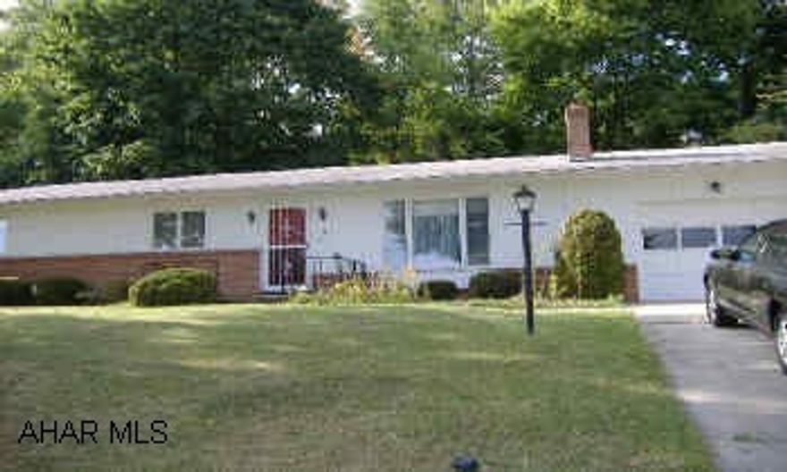 Loads of potential and great location for this ranch home with hardwood floors and private rear yard. Needs some updating. Good mechanics.