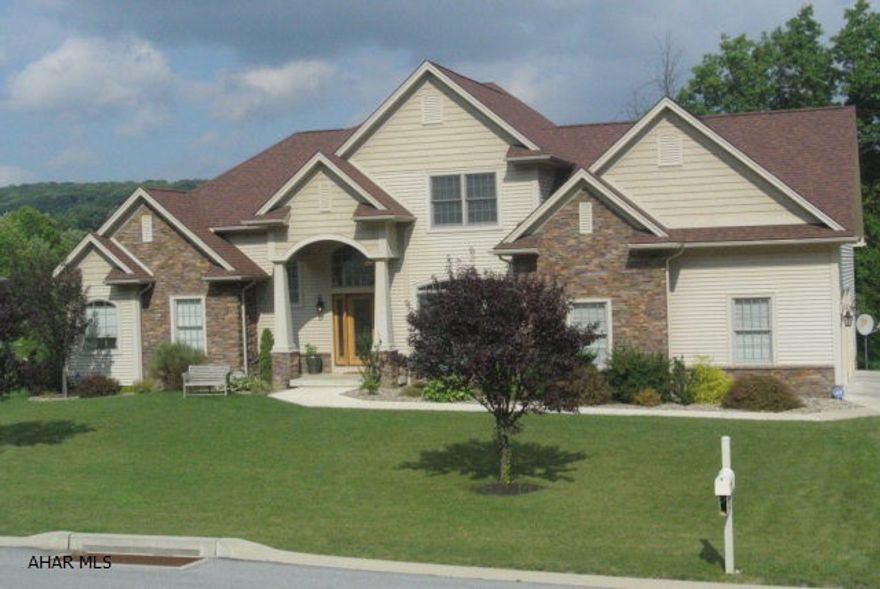 This Exquisite Architectural home is just unmatched in Style and Presence...From its eye-catching Arches and stacked horizontal natural ledge-stone, to its dominate roof lines really shows off its unique character.. Where maybe 'French Country' meets 'New American' Creating that asymmetrical facade. The contemporary interior open design delivers incredible space and light derived from an astonishing Great Room centralized in this magnificent home.  The ceilings and beautiful windows extend 2 stories capturing that beautiful morning sun.  The  kitchen accentuates a modern yet charming balance with its Craftsman style cherry cabinetry, spectacular VIKING double wall oven and 5 burner stainless cooktop, and granite counters.  The Master suite designed for two w/ separate closets and vanities.