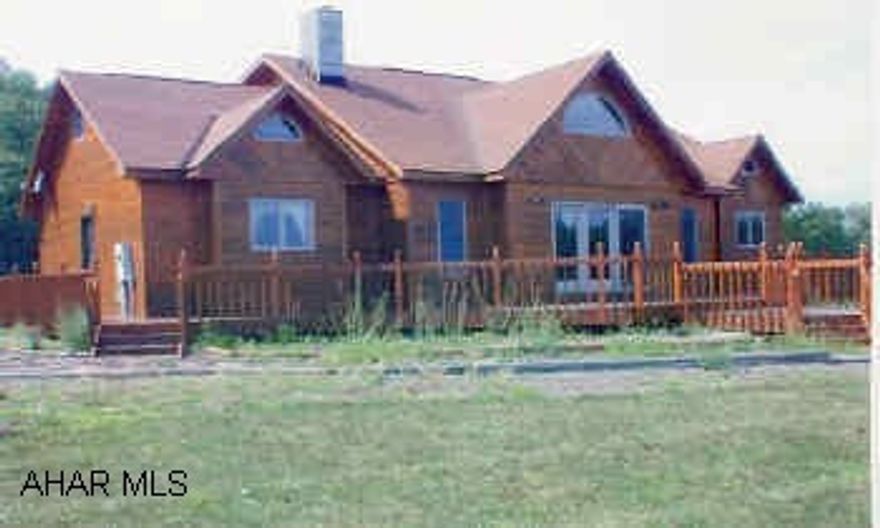 One and a half story comtempory cedar home on 49 secluded acres.  Four Bedrooms, Great Room with stone fireplace.  Wraparound deck to enjoy the view.