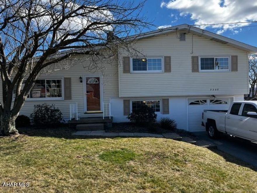 Desirable Hollidaysburg - Spacious, multi-level, 4 bedroom, 3 full baths, beautifully refinished hardwood throughout, hot water baseboard, central air - a must see!
New Roof to be put on before closing!!