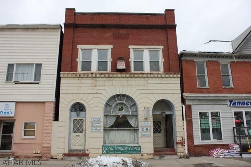 Commercial storefront and apartment building on Main Street in Bellwood. Highly visible area conveniently located between Altoona and State College with easy access to I-99. Approximately 3,120 SF with high ceilings and endless opportunities. Call for showing.