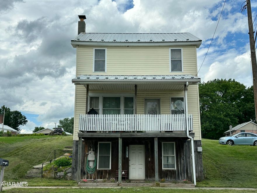 Move in ready with plenty of living  space.  Enjoy warm summer evenings on your back porch.  This home has a large yard and off street parking.  The woodburner in the kitchen stays.  This home may be the one for you.