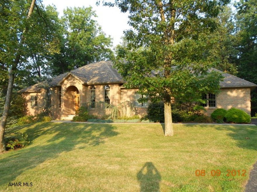 Upper end one story. Approx. 3600 sq. ft. with 4 bedrooms and 4 baths. Open plan some granite in  kitchen with gourmet appliances and cherry cabinets. 3 car garage. Ample storage. Gas fireplaces with custom oak mantles.